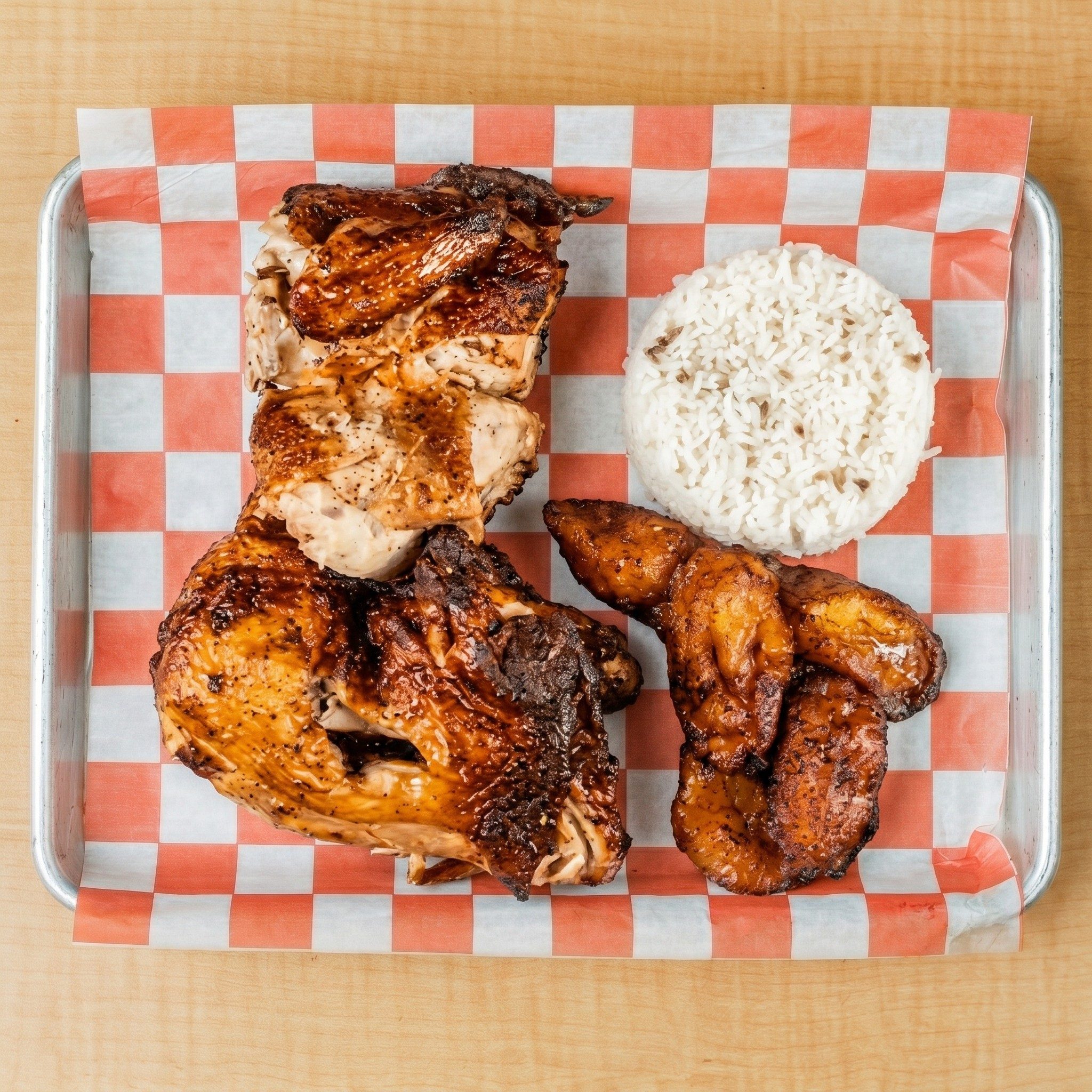 1/2 Charcoal Grilled Chicken with 2 Sides.